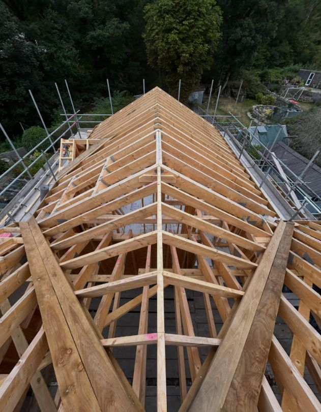 New timber cut roof structure on scaffolding